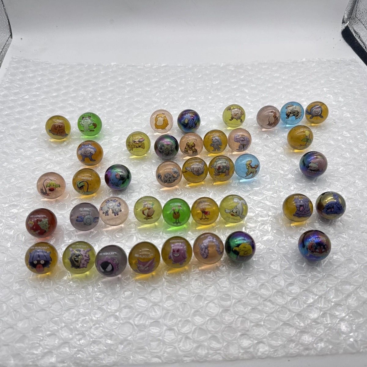 Official Pokémon Loose Merchan - Vintage Collectible Marbles ulasan dan harga